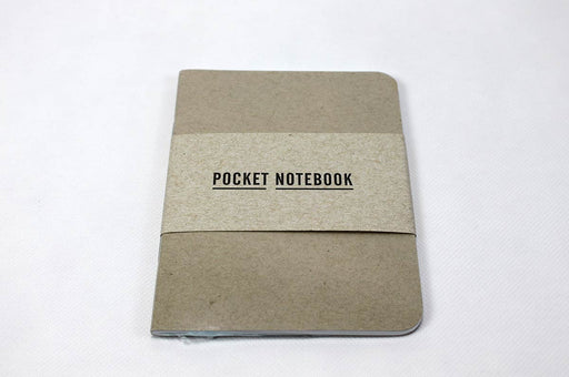 Natural kraft pocket notebook with white pages packaged in a clear plastic film and a paper band.