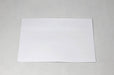 Single blank white wove envelope laying flat on a light textured background.