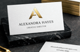 Custom 38pt ultra-thick cotton letterpress business card with gold foil monogram accent and gilded edges for Alexandra Hayes, Creative Director, printed by Clubcard Vancouver