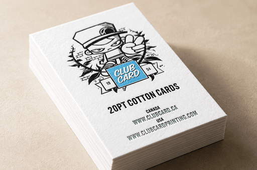 Stack of custom 20pt cotton business cards with the Clubcard logo blind debossed over a metallic blue foil stamped square, printed by Clubcard Vancouver