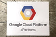 Custom shape vinyl sticker sample featuring the colorful Google Cloud Platform Partner logo on a white backing, printed by Clubcard Vancouver