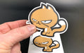 Hand peeling a custom shape vinyl sticker sample featuring Clubcard Vancouver's orange grumpy cat mascot character illustration, printed by Clubcard Vancouver