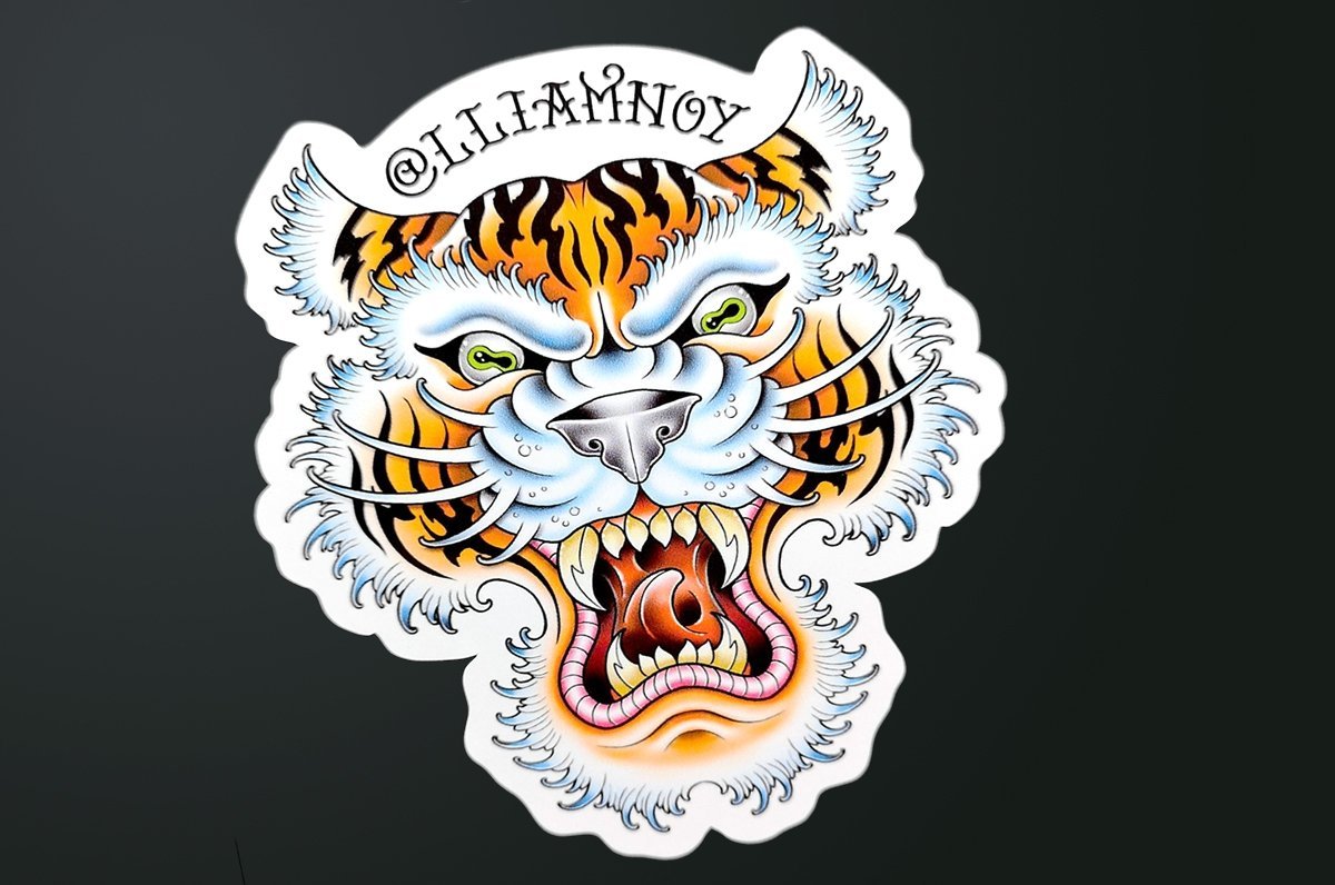 Custom shape vinyl sticker sample featuring a detailed traditional tiger head illustration, printed by Clubcard Vancouver