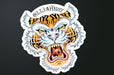 Custom shape vinyl sticker sample featuring a detailed traditional tiger head illustration, printed by Clubcard Vancouver