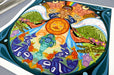 Large fine art print sample featuring an oval-trimmed, vibrant, intricate colourful mandala artwork, printed by Clubcard Vancouver