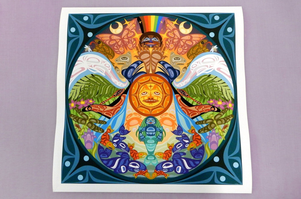Large fine art print sample featuring a vibrant, intricate colourful mandala artwork with a central sun motif, printed by Clubcard Vancouver