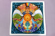 Large fine art print sample featuring a vibrant, intricate colourful mandala artwork with a central sun motif, printed by Clubcard Vancouver