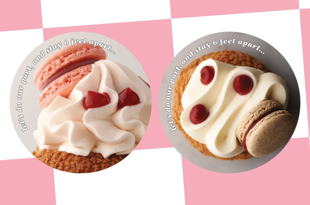 Two custom circular vinyl floor stickers featuring mouth-watering pastry illustrations and the text "let's do our part, and stay 6 feet apart..." set against a pink checkered backdrop.