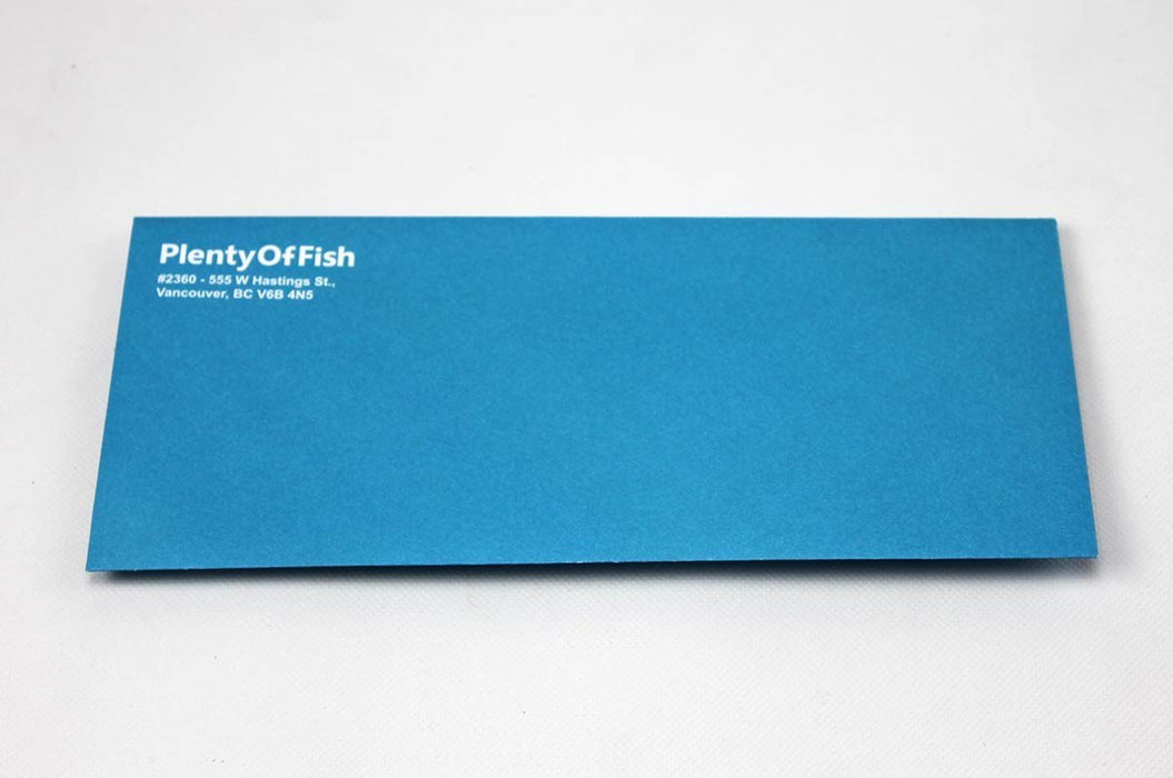 Angled view of a custom printed blue Plenty Of Fish No. 10 uncoated envelope sample