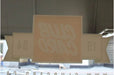 Interior reverse view of a custom printed vinyl window sticker applied to glass showing translucent backing
