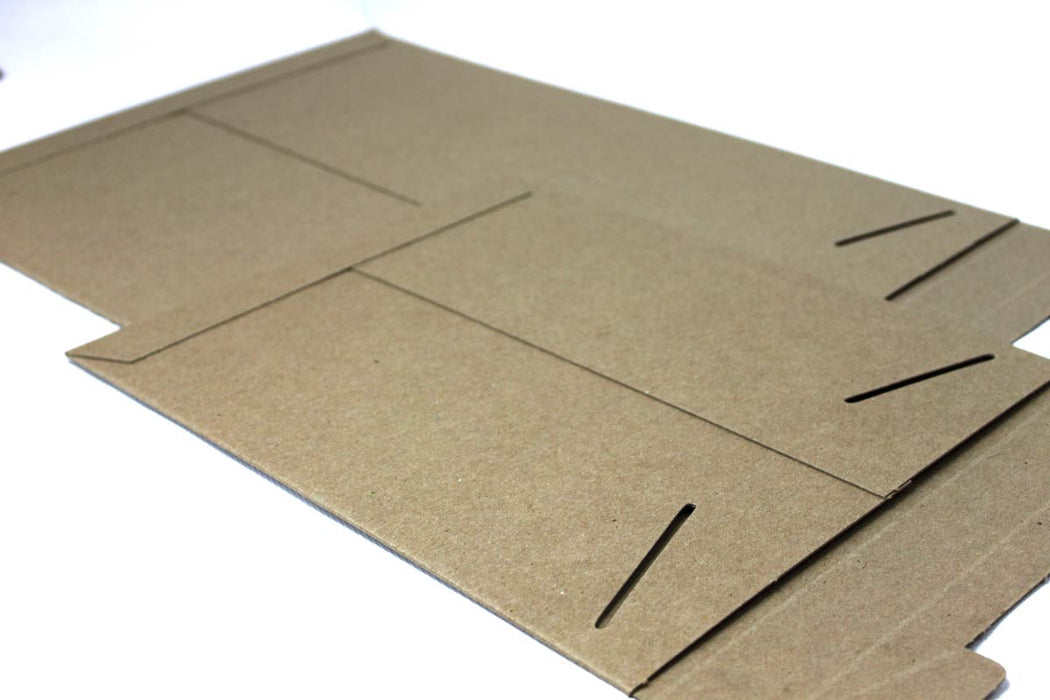 Close-up view of an open brown kraft stay-flat mailer showing the locking tab and closure slots.
