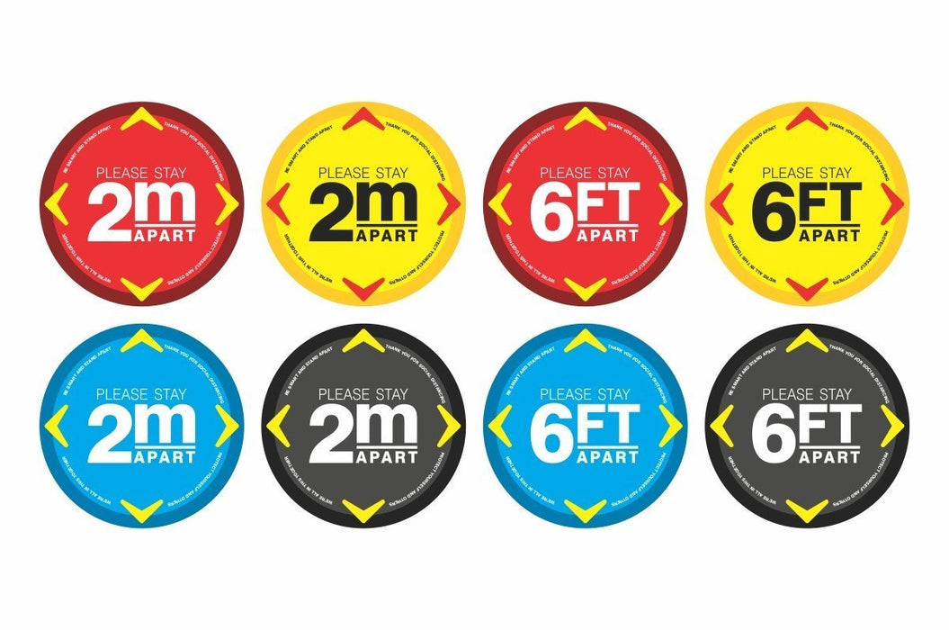 Grid of eight round social distancing floor decals reading Please Stay 2m Apart and Please Stay 6FT Apart in red yellow blue and black