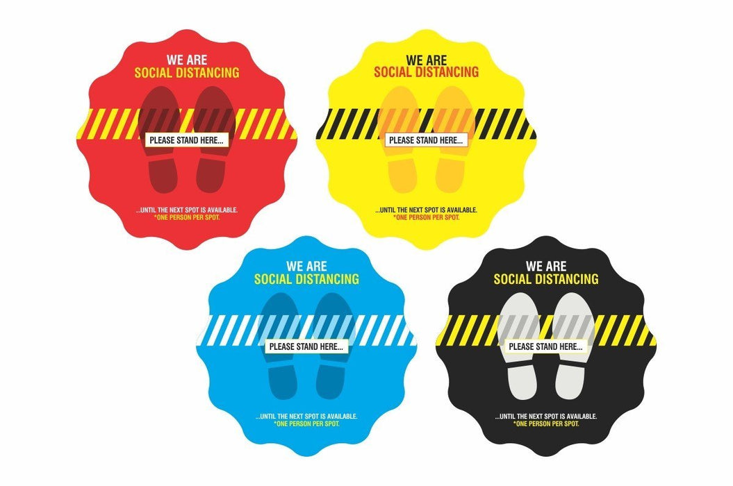 Four scalloped circular social distancing floor decals with footprints in red yellow blue and black