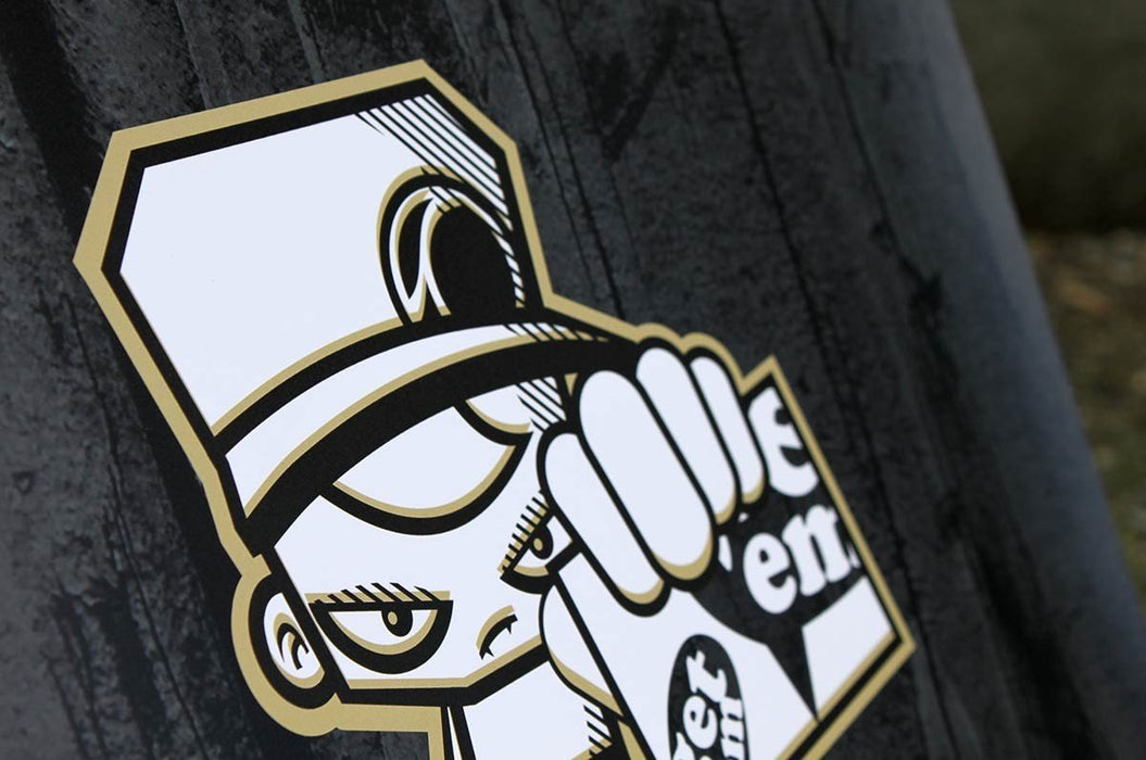 Close-up detail shot of a custom cartoon character graphic printed on smooth anti-curl vinyl for a tabletop retractable banner stand.
