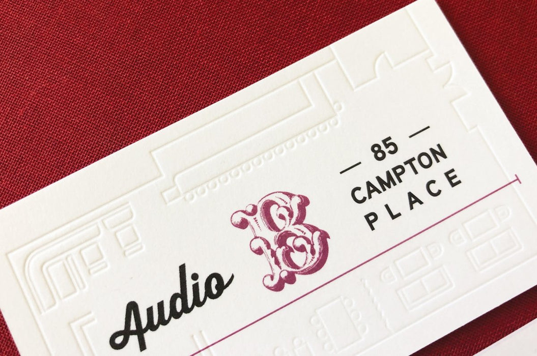Business card for Audio with debossed elements printed on 32pt uncoated card stock | Clubcard Printing