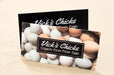 Bamboo business cards of Vick's Chicks displaying a stack of Organic Farm Fresh Eggs.