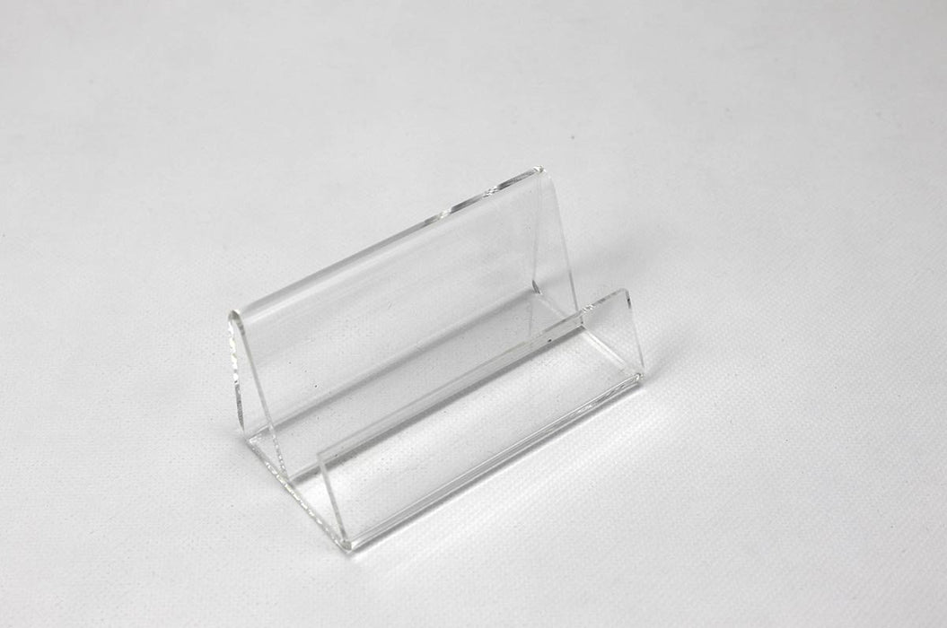 Horizontal clear acrylic business stand frame on a white background.