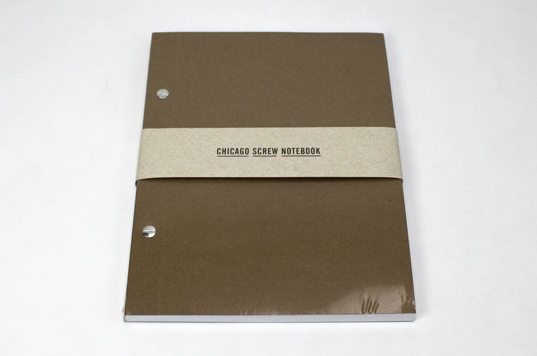 Chicago screw notebook packaged in a clear plastic file and a paper band.