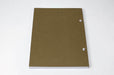 Back cover of a chicago screw notebook with kraft brown cover, white pages and silver screws.