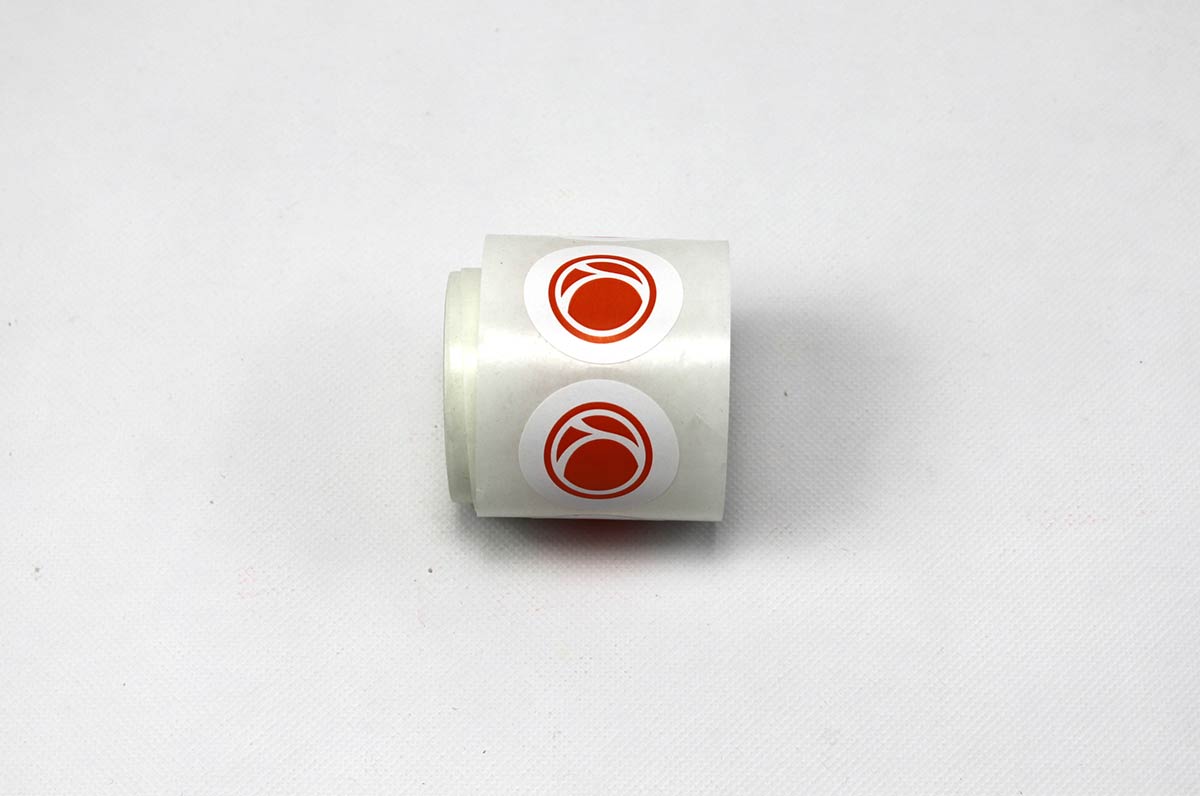 Standard Shape Non-Weatherproof Flexo Stickers on rolls | Clubcard logo icon printed in red ink on white glossstock | Clubcard Printing Vancouver